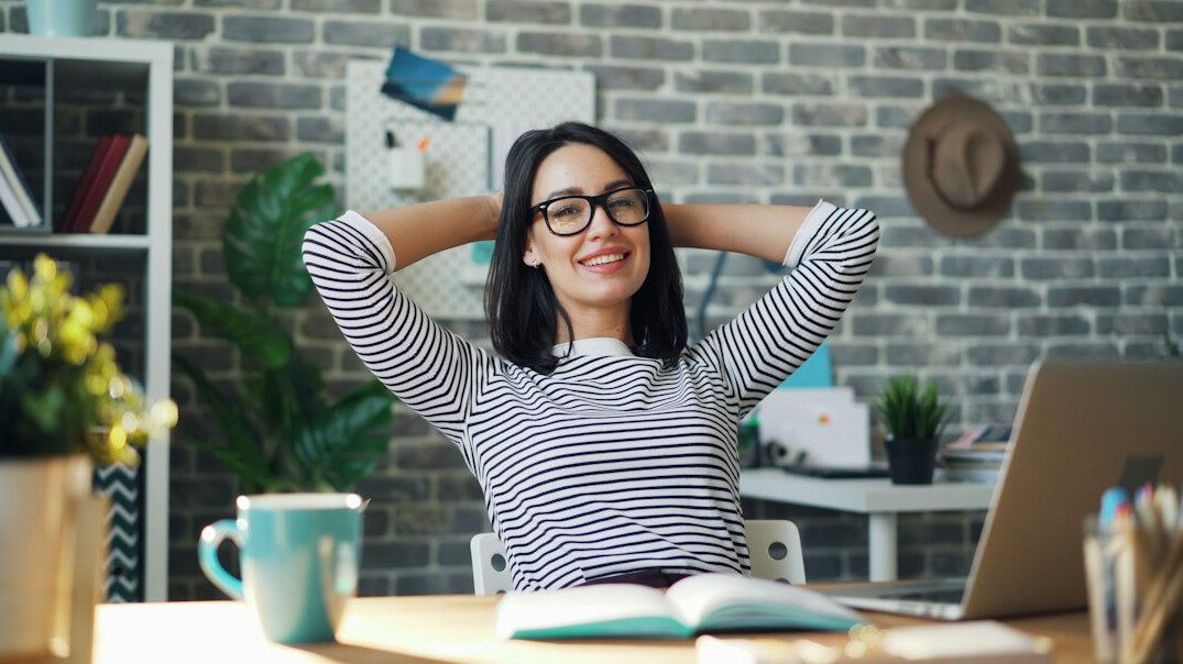person doing yoga at desk