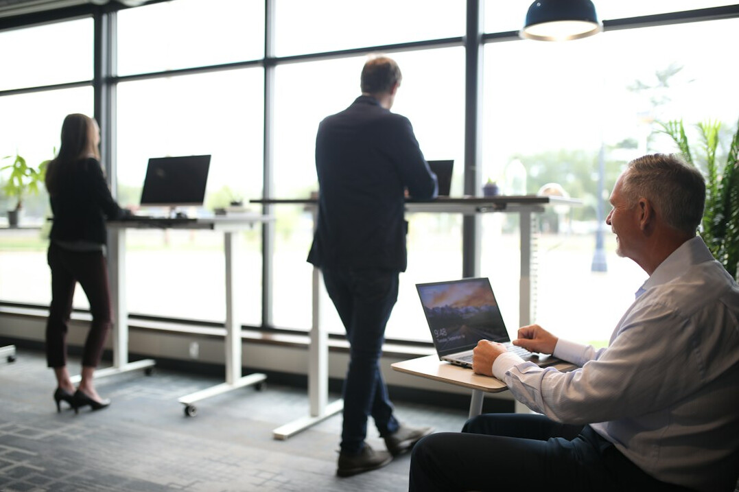 employees exercising in office
